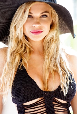 Dani Mathers wearing sexy black hat very nicely