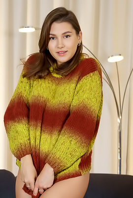 Ellie Luna Lifts Her Cozy Sweater To Reveal She