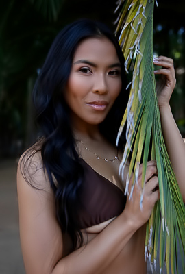 Jada Kai Pose Of Unshakable Power By Palm Tree In Bikini