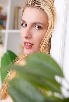 Lillie grabs the chair and teases with a topless dare in her bedroom