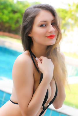 Russian bikini model Yaryna teasing by the pool