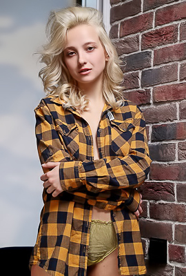 Lily Shawn Slips Off Her Panties For An Enticing Rear View Of Her Shaved Pussy