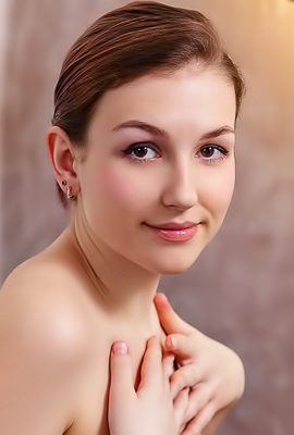 Isabele Parts Her Thighs To Frame Her Shaved Pussy