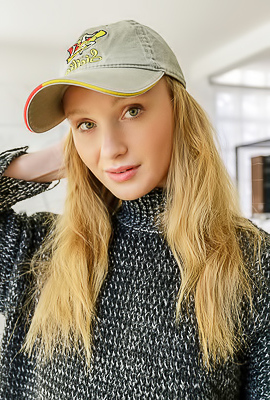 Dana Red With Strawberry-blonde Hair Lounging Naked In An Armchair