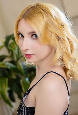 Minnie Lighter Squeezing Her Gorgeous Breasts And Smiles Seductively