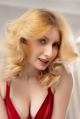 Minnie Lighter Teases On The Couch With Seductive Lingerie And Alluring Curves