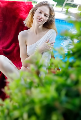 Alice May Wades Out Of The Pool And Spreads Across A Red Velvet Lounger