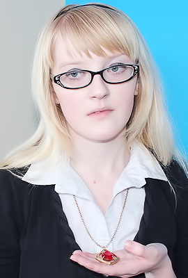 Krystal Orchid Licks Her Lips in the Bedroom As Glasses Slide Down